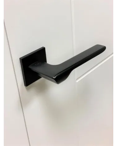 Palanca de puerta de material zamak LIGNE herraje de diseño vista superior inclinada