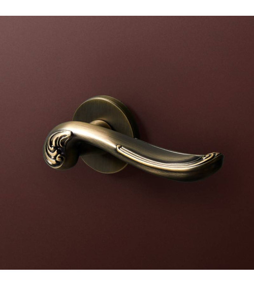 Manija de puerta en zamak ERIS herraje de diseño