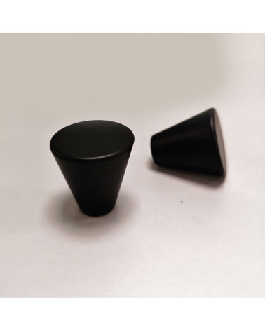 Botón de mueble negro AMBIENT tirador de diseño sobre un fondo