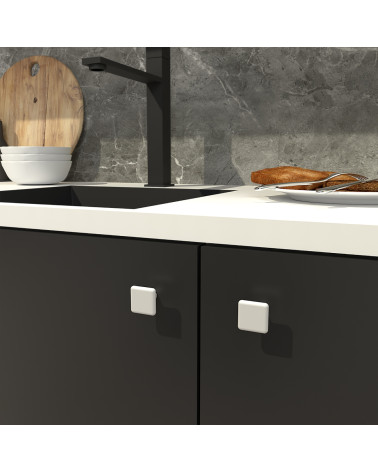Botón de mueble blanco NOX tirador de diseño fijado en un mueble