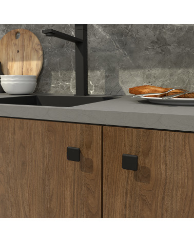 Botón de mueble negro NOX tirador de diseño fijado en un mueble