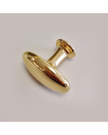 Botón de mueble oro pulido NAPOLI tirador de diseño vista lateral sobre fondo gris