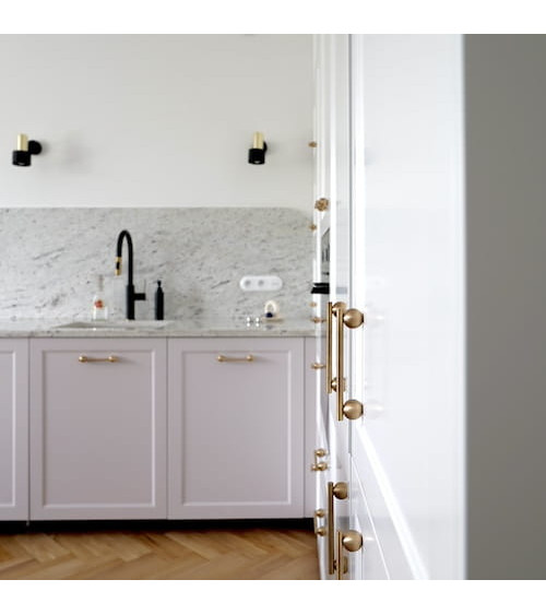 Tirador de mueble en latón brillante modelo 04
