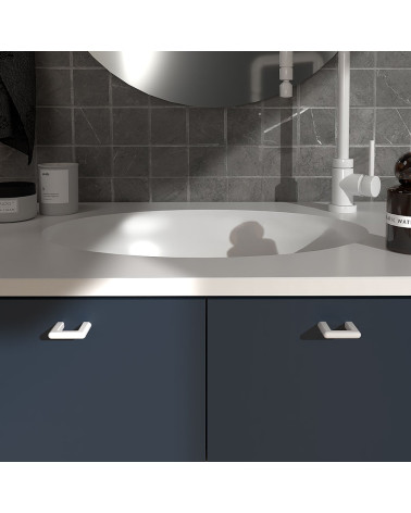 Tirador de mueble blanco brillante NOX tirador de diseño montado en un mueble de baño