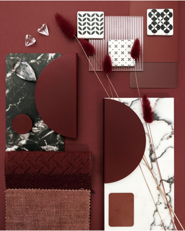 Tirador de diseño burdeos ZORIA tirador de diseño presentado con materiales decorativos
