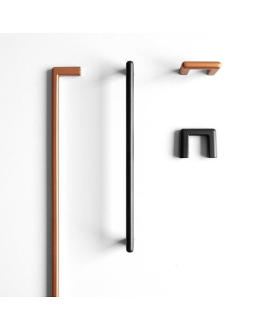 Tirador de mueble cobre NOX tirador diseño dispuesto sobre un fondo blanco