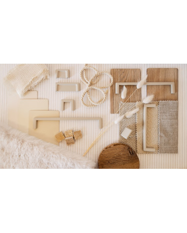 Tirador de mueble cachemir NOX tirador de diseño presentado con materiales decorativos