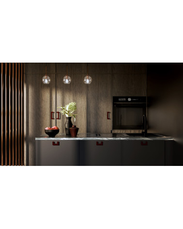 Tirador de mueble burdeos SOLEA tirador de diseño montado en un mueble
